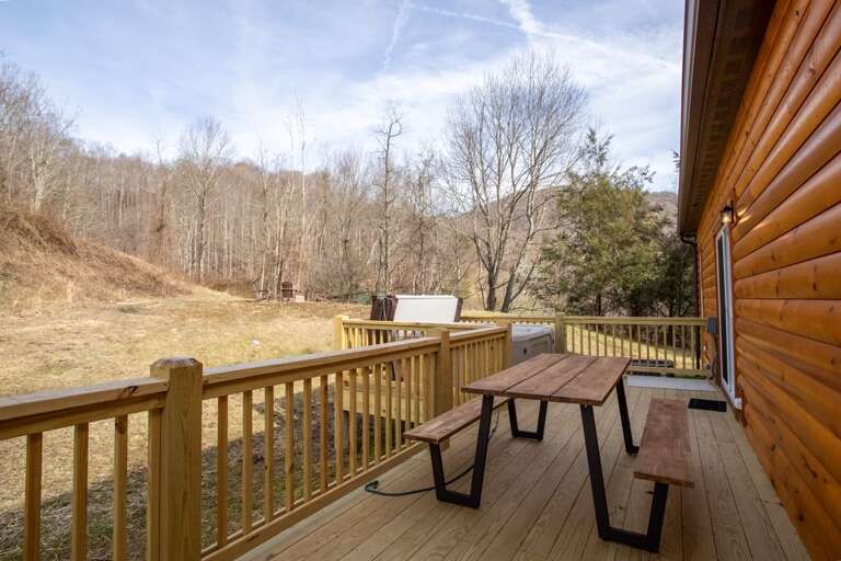 Relax in the Hot Tub on the Back Deck or Enjoy a Meal at the Picnic Table