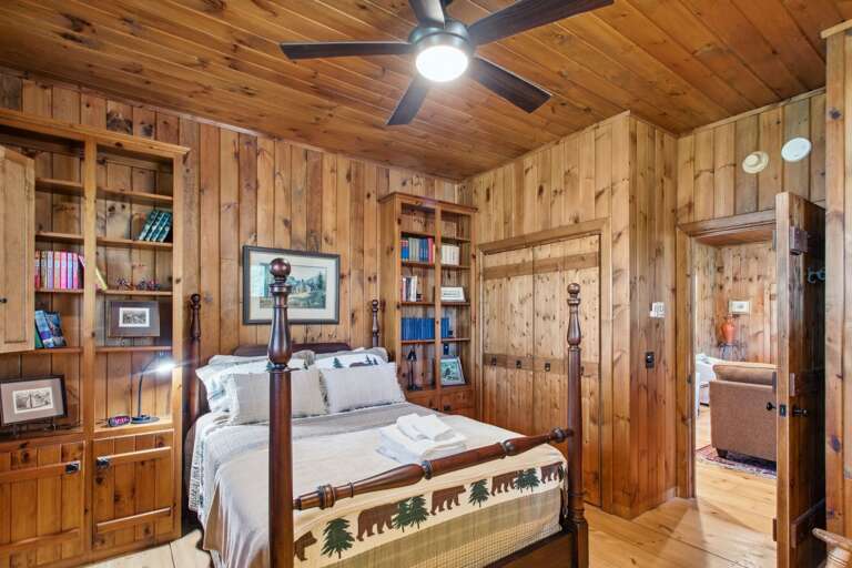 Main Floor Bedroom with Full Bed and Door to the Exterior