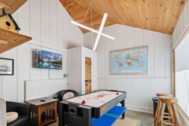 Multi-Game Game Table and Smart TV in the Entertainment Room