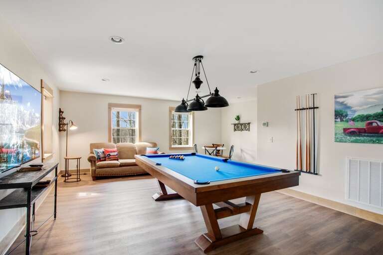 Lower Level Game Room with Pool Table and TV