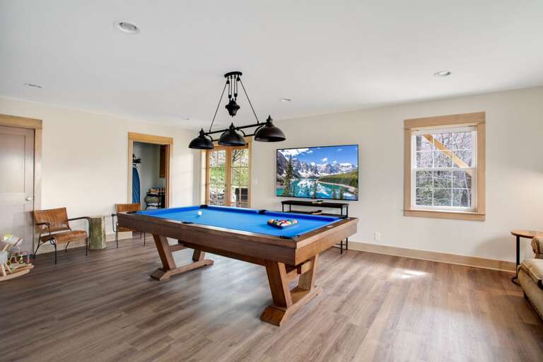 Pool Table in the Game Room with Access to the Covered Lower Deck