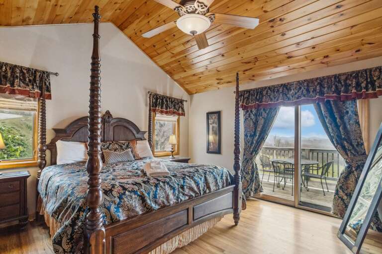 Main Level Master Bedroom with King Bed and Access to the Deck