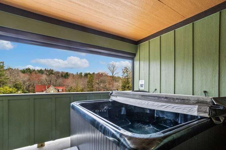 Hot Tub on the Patio with a Remote Controlled Blind to Open or Close for Privacy