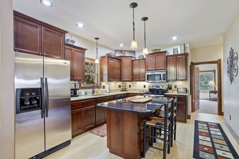 Open Kitchen with Stainless Steel Appliances