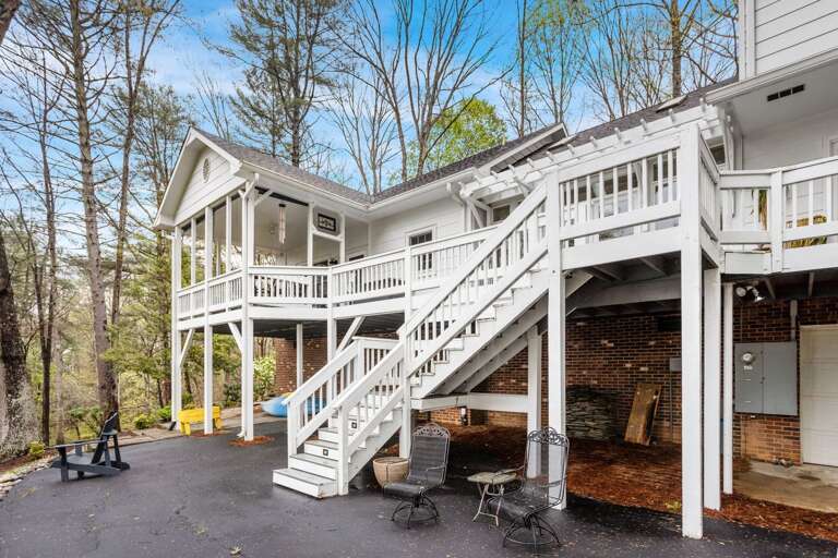 Stairs From Upper Level to Lower Level Paved Patio