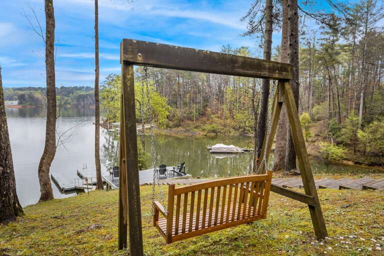 Wooden Bench Swing Overlooking the Lake