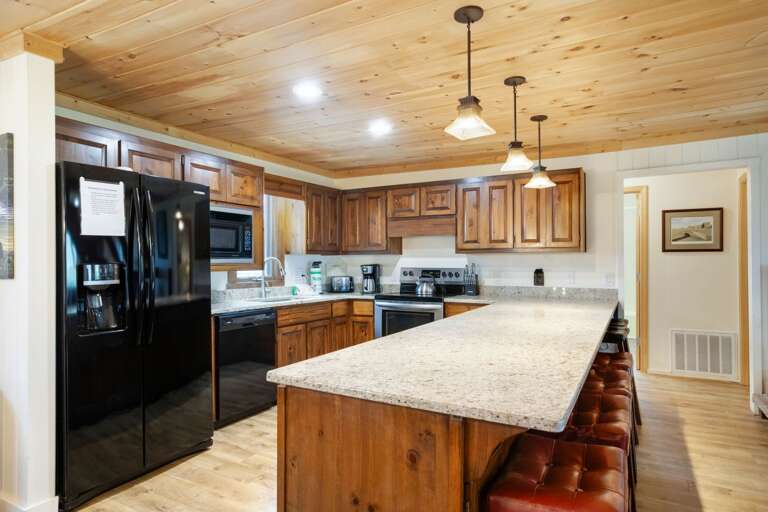 Granite Countertops and Large Bar with Seating