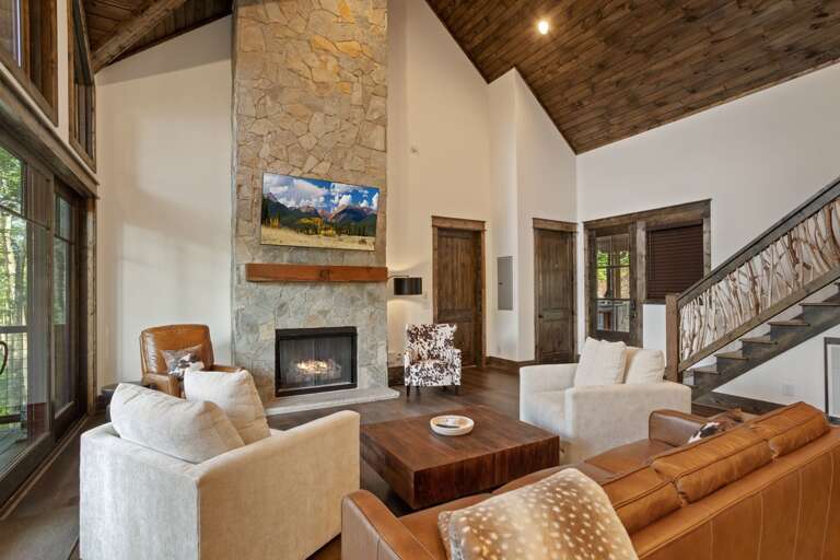 Stacked Stone Gas Fireplace and TV in the Living Room
