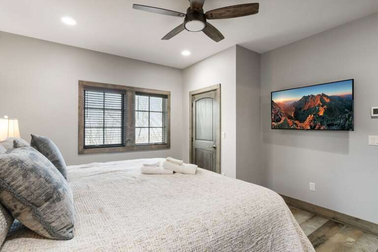 Main Floor King Bedroom with TV and Ensuite Bathroom