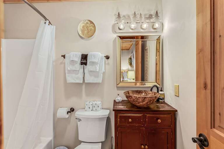 Private Bathroom with Tub and Shower Combo in the Queen Bedroom