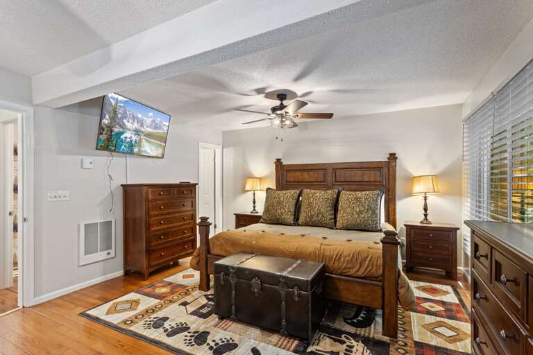 Master Bedroom with TV and Private Ensuite