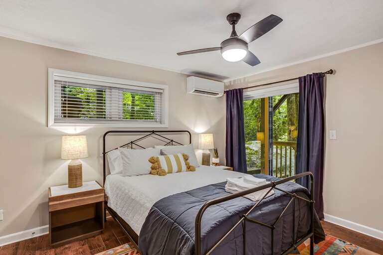 Lower Level Bedroom with Queen Bedroom and Access to the Lower Deck