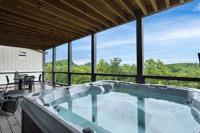 Lower Level Deck with Hot Tub and Sitting Areas Lower Level Deck with Hot Tub and Sitting Areas