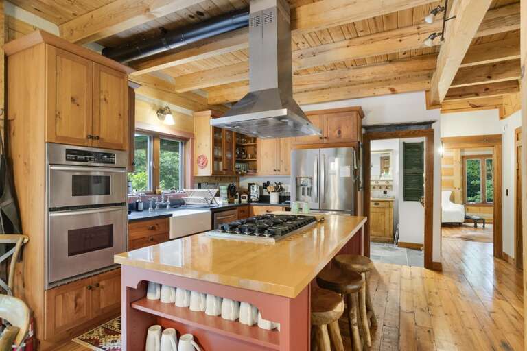 Large Island with Cooktop and Seating for Three Large Island with Cooktop and Seating for Three