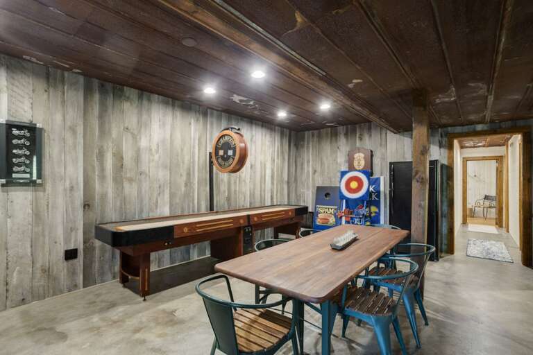 Lower Level Game Room with Shuffleboard Table, Game Table, Darts, Axe/Ninja Star Throwing Yard Game Lower Level Game Room with Shuffleboard Table, Game Table, Darts, Axe/Ninja Star Throwing Yard Game
