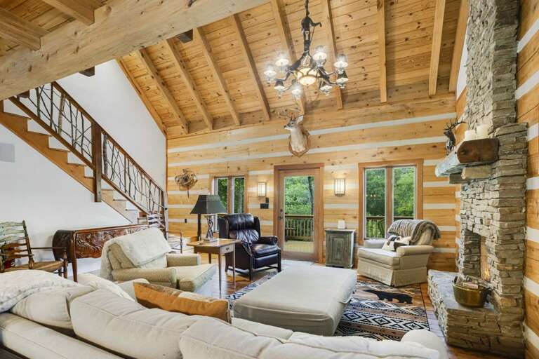 Spacious Living Room with Vaulted Tongue and Groove Ceilings and Comfortable Furniture Spacious Living Room with Vaulted Tongue and Groove Ceilings and Comfortable Furniture