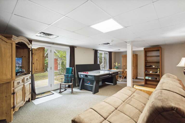 Lower Level Den with Air Hockey Table and Ping Pong Table