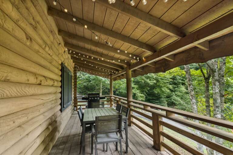 Covered Deck with Outdoor Dining and Gas Grill