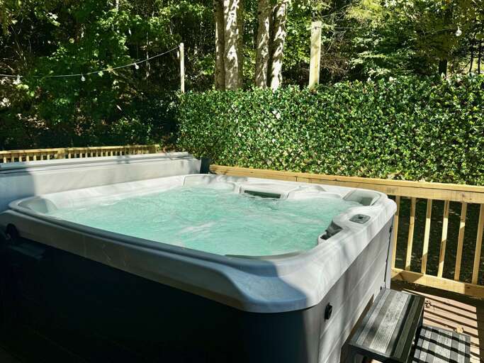 Hot Tub on Deck of Main Floor  Bedroom