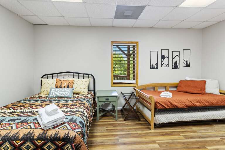 Lower Level Bedroom with Queen Bed and Twin Daybed with Twin Trundle