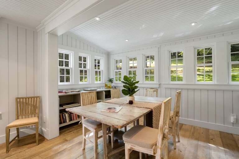 Game Table in the Lounge Space Overlooking the Grounds Game Table in the Lounge Space Overlooking the Grounds