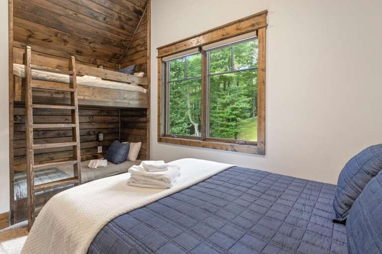 Upper Level Bunk Room with Twin Over Twin Bunk and a Queen Bed