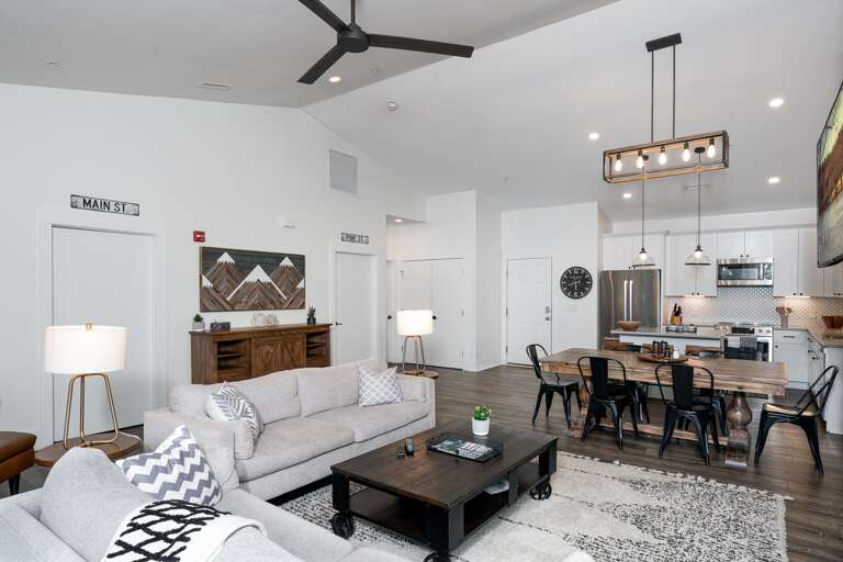 Interior Living Space With Kitchen, Dining And Lounge Areas