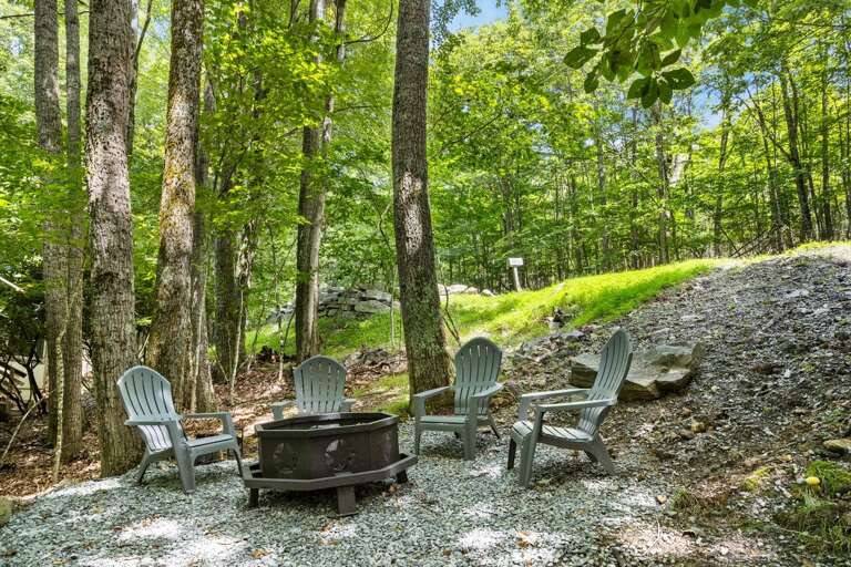 Wood Burning Fire Pit with Adirondack Seating