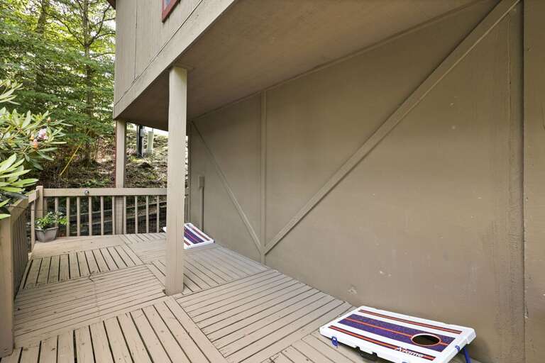 Corn Hole Game on a Covered Portion of the Lower Deck