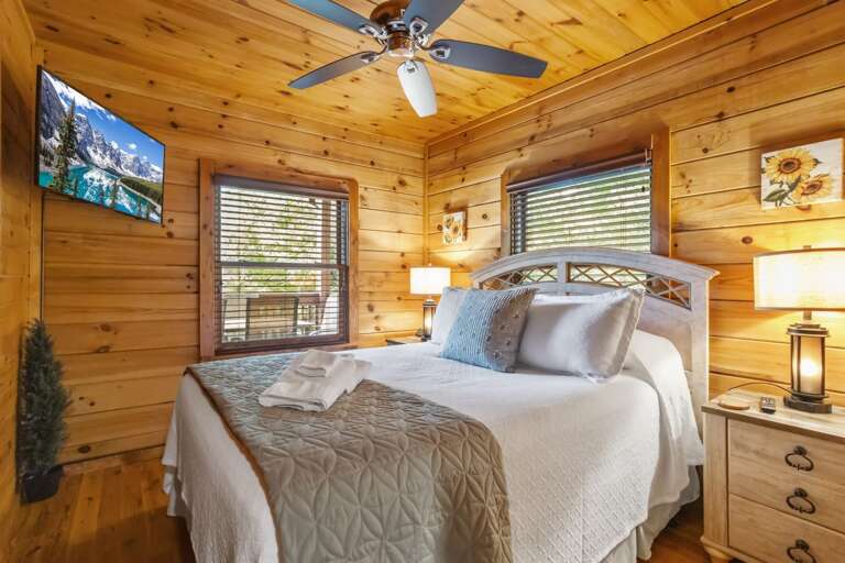 Main Floor Queen Bedroom with TV