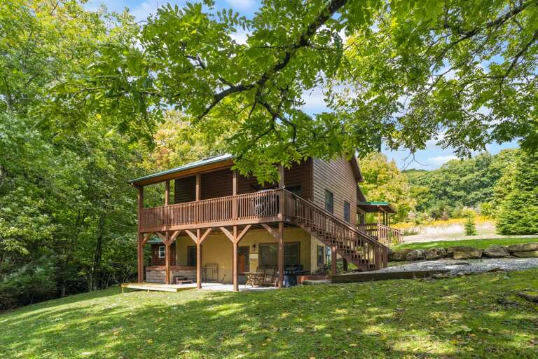 Upper Deck and Lower Patio Overlook the Spacious Yard