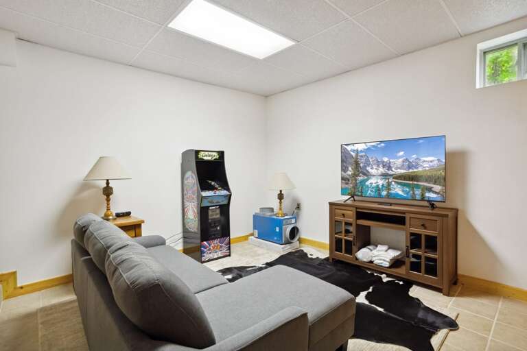 Lower Level Den with TV and Arcade Game