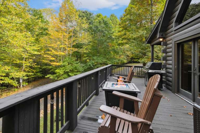 Main Level Deck has a Gas Grill and Fire Table