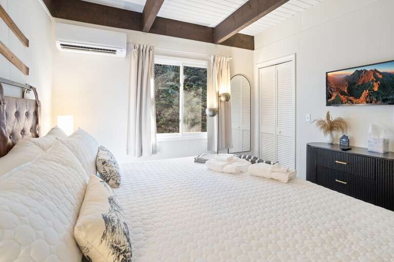 Bright Comfortable King Room with TV on the Main Floor