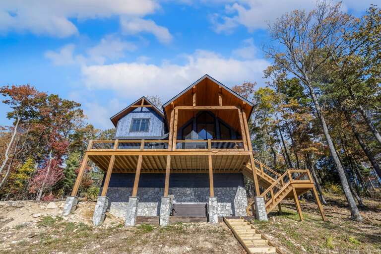 Looking Up to the Lower Level Hot Tub Patio and Flight of Stairs to the Main Level Deck