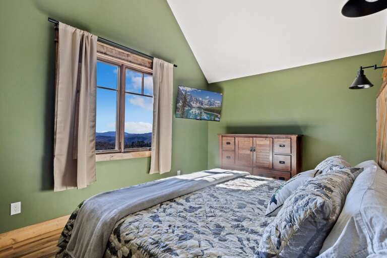 Upper Level King Bedroom with TV and Mountain Views