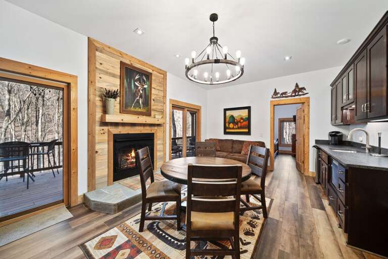 Couch, Game Table, Kitchenette and Lower Level Deck