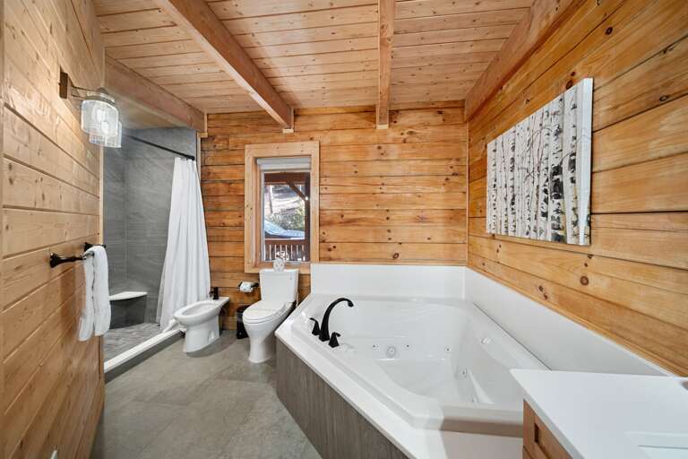 Master Bathroom with Soaking Tub and Large Tiled Step-In Shower
