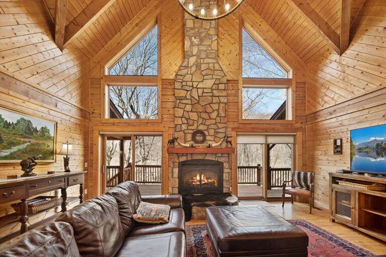 Stacked Stone Gas Fireplace Flanked with Windows