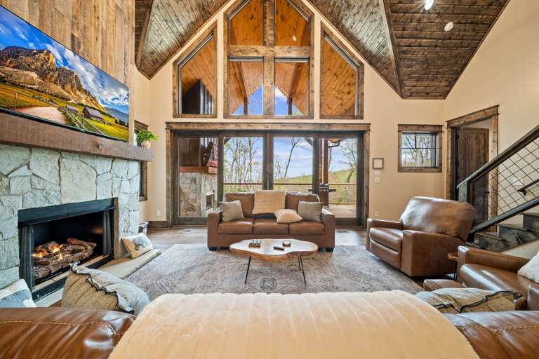 Gas Fireplace, Leather Sofas and Custom Wood Accents