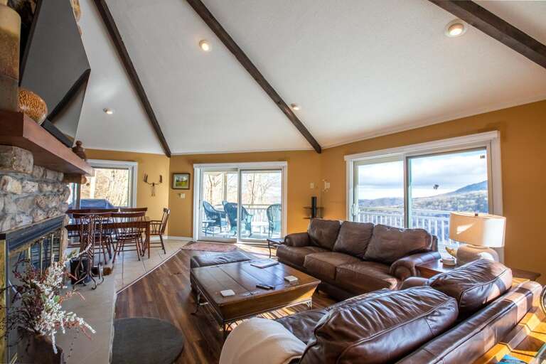 Living Area and Dining Surrounded by Windows and Big Views