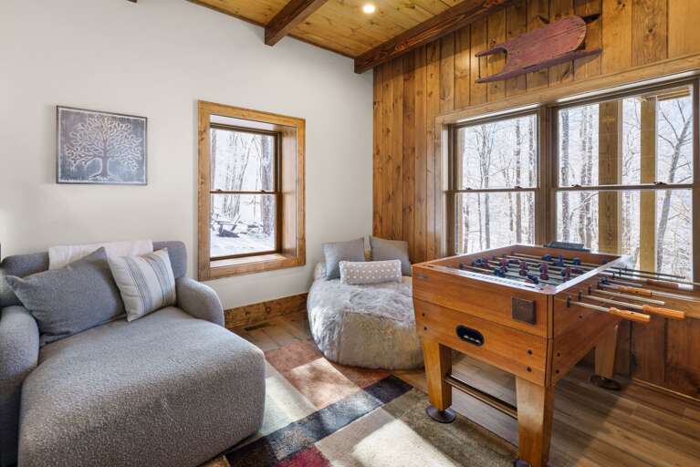 Foosball and Lounging Chairs in the Bunk Room