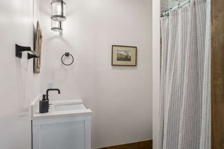 Lower Level Hall Bathroom with Step In Shower