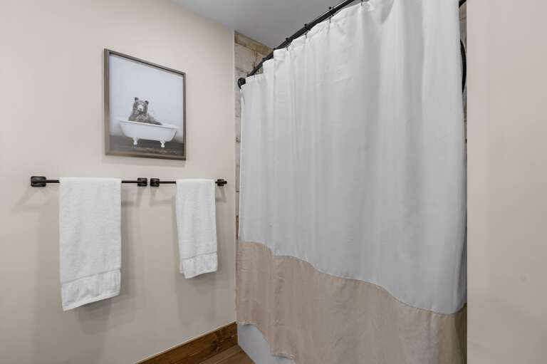 Tub and Shower Combo in the Ensuite Bathroom