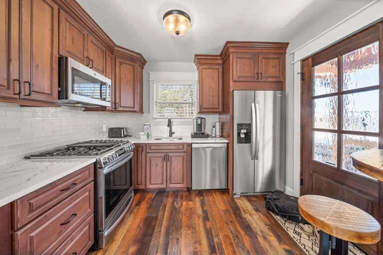 Fully Stocked Apartment Kitchen with Gas Stove
