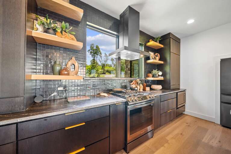 Gas Stove and Beautiful Tile Blacksplash