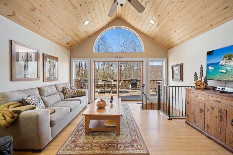 Living Room with TV and Picturesque Windows