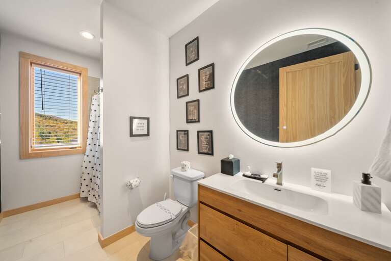 Main Floor Full Bathroom with a Tub and Shower Combo