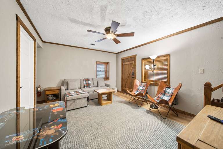 Lower Level Den with Arcade Game and Twin Size Sleeper Sofa