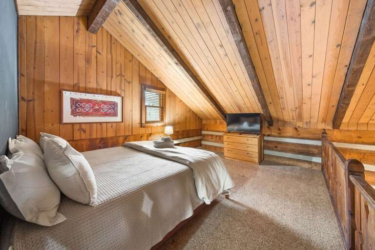 Loft Sleeping Area with King Bed and TV